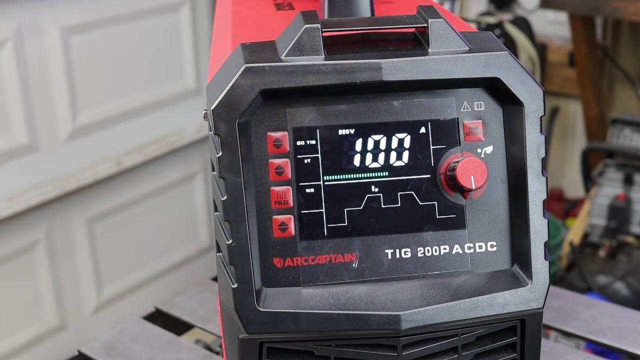 ARCCAPTAIN TIG 200P ACDC welder showing 89 amps on its digital display, with gloves and accessories on the table.