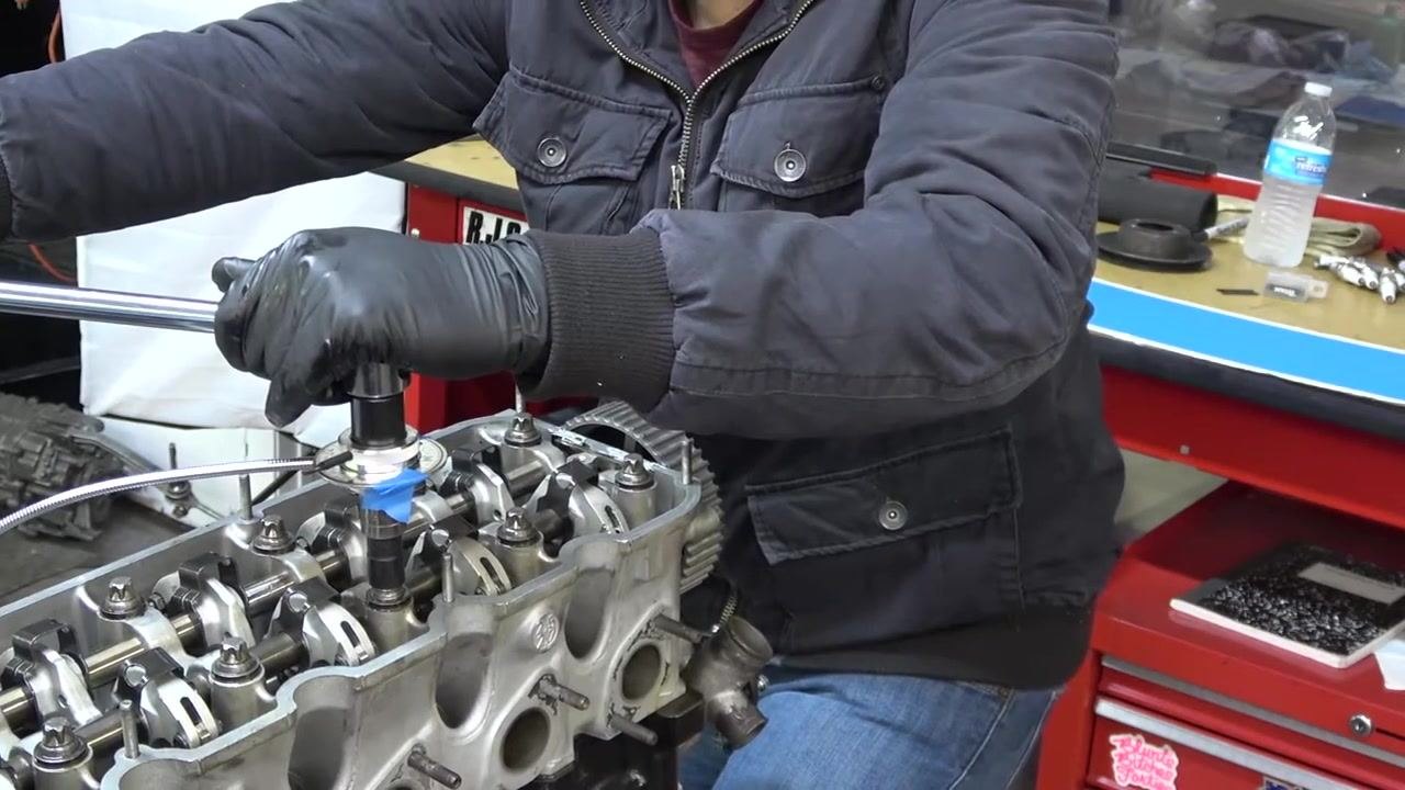 Close-up of the angle gauge showing a reading slightly above 90 degrees, with the torque wrench still attached.