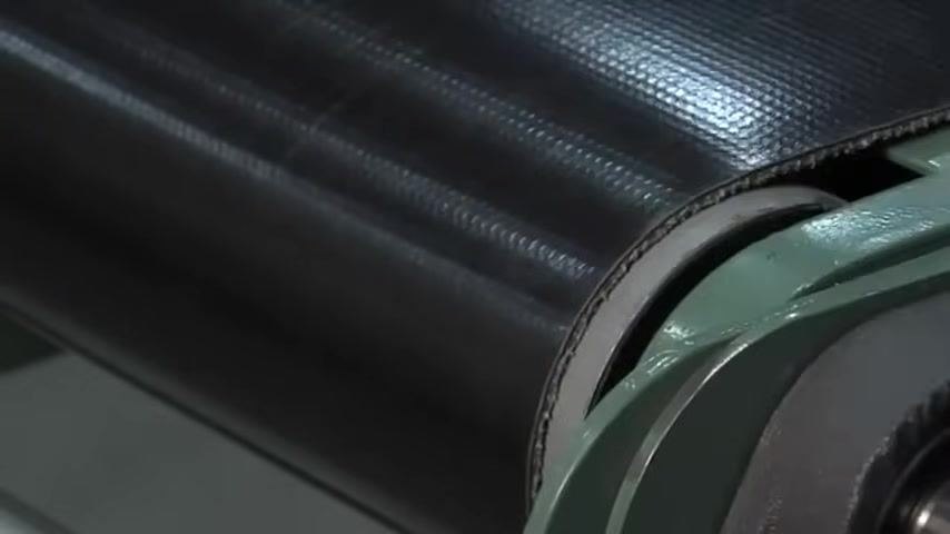 Conveyor belt properly seated and centered on the pulley