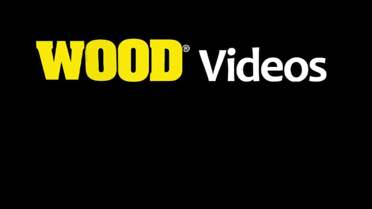 A black screen with the bold yellow and white text "WOOD Videos" centered, indicating the end of the video.
