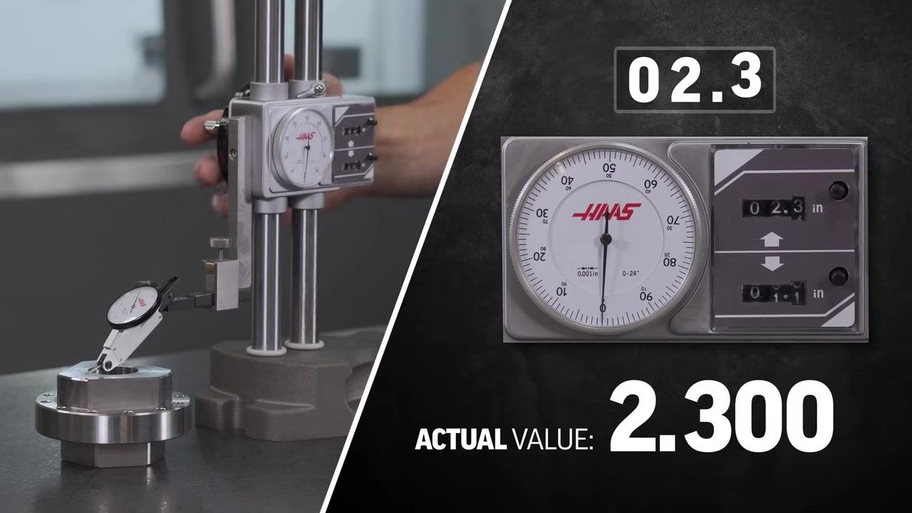 Split view showing a hand lowering the gauge on the left, and on the right the dial at zero with counters at 2.3 inches and the label "Actual Value: 2.300."