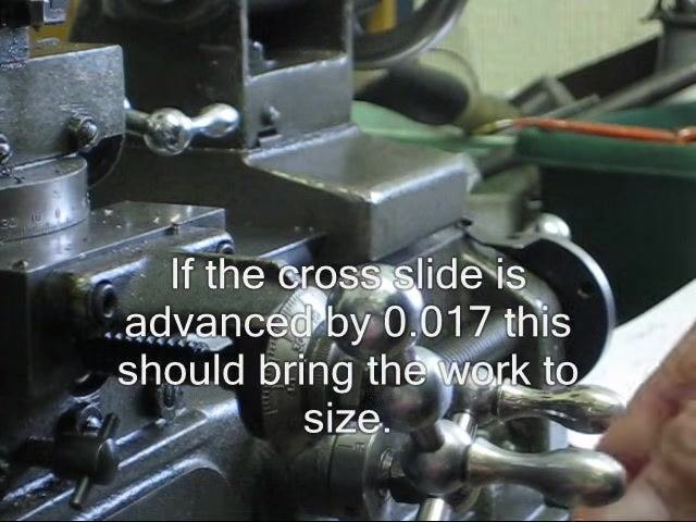 Lathe spindle coming to a stop with the workpiece and tool visible.