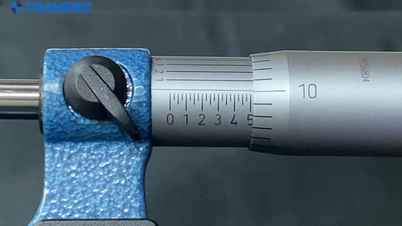 Micrometer with the "5" mark on the sleeve and the "10" on the thimble aligned, indicating 0.510 inches.