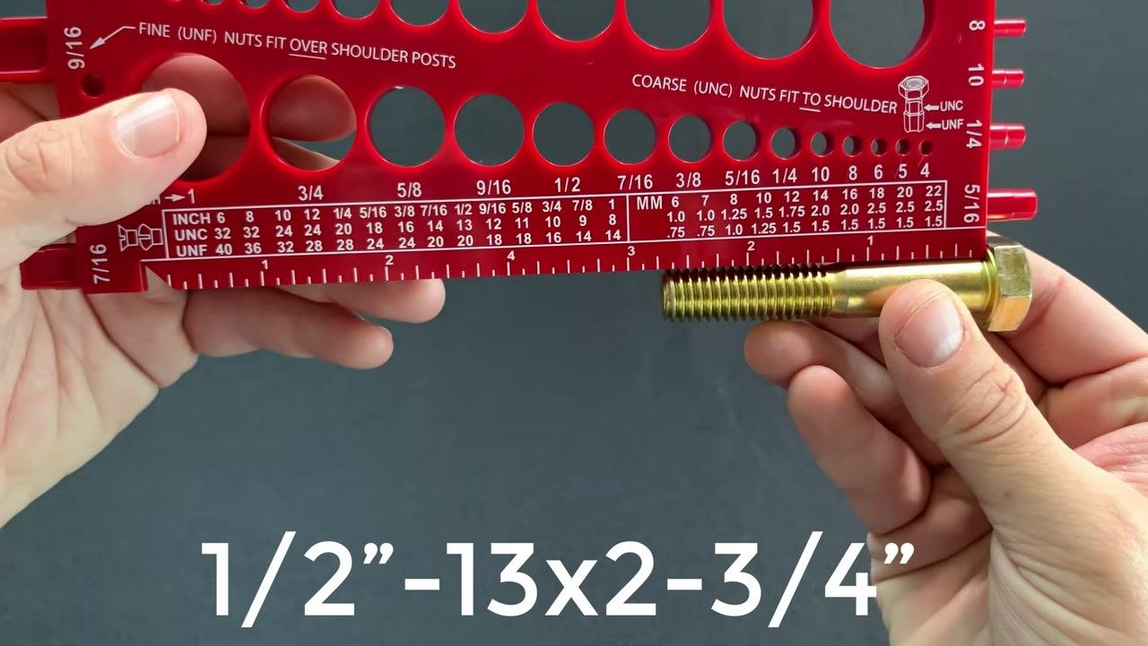 The gold bolt aligned with the ruler on the red gauge, showing a length of 2-3/4 inches, with the text "1/2”-13x2-3/4”" overlaid.
