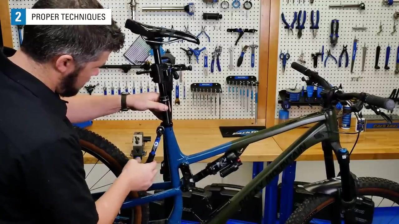 A torque wrench set to 10 Nm is attached to a VeriTorq torque tester, with the display reading 0.000.