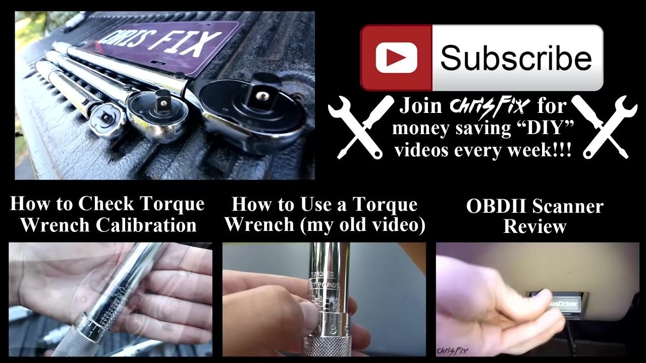 A torque wrench is held in both hands above a set of other torque wrenches and a breaker bar on a truck bed, with a "CHRIS FIX" license plate in the background
