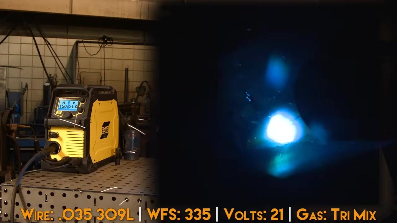 Welding machine on a perforated table with display showing 335 WFS and 21.0 volts, alongside a parameter overlay confirming Wire, WFS, Volts, and Gas settings.