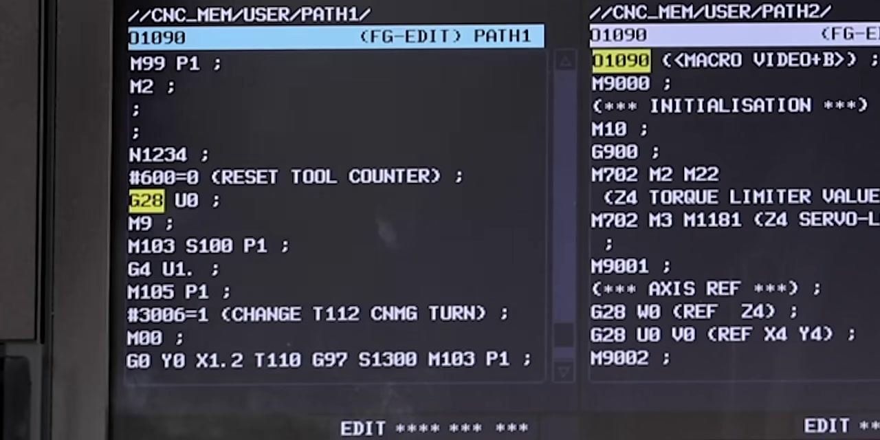 Close-up of the CNC screen showing the spindle stop command and confirmation message