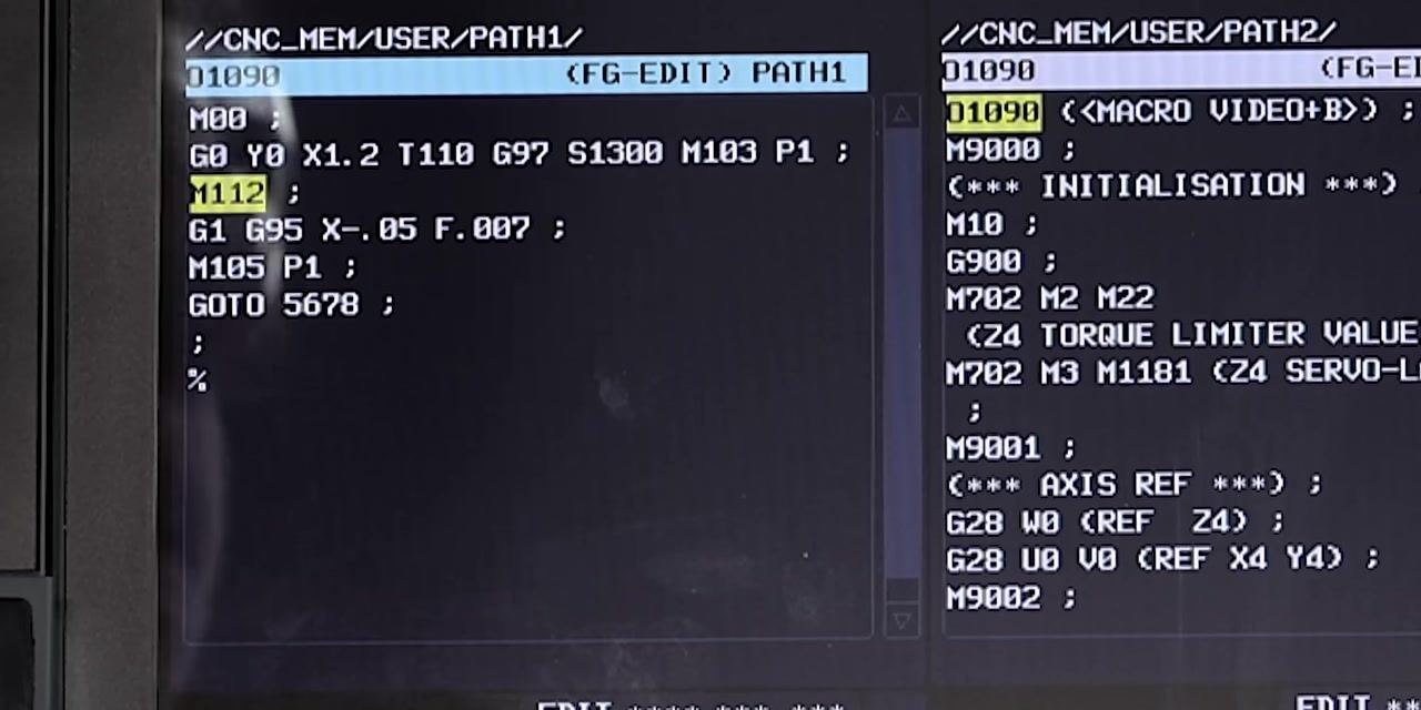 CNC screen showing program lines including #600=0 (RESET TOOL COUNTER);, G28 U0;, M9;, M103 S100 P1;, G4 U1.;, M105 P1;, #3006=1 (CHANGE T112 CNMG TURN);, and M00; with the M00 line highlighted