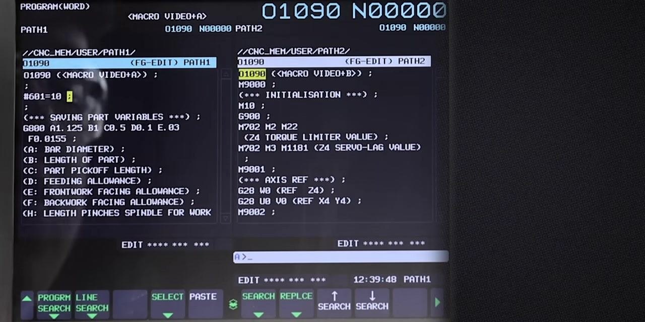 Operator pointing at the CNC program editor to show the tool path section where the counter will be added