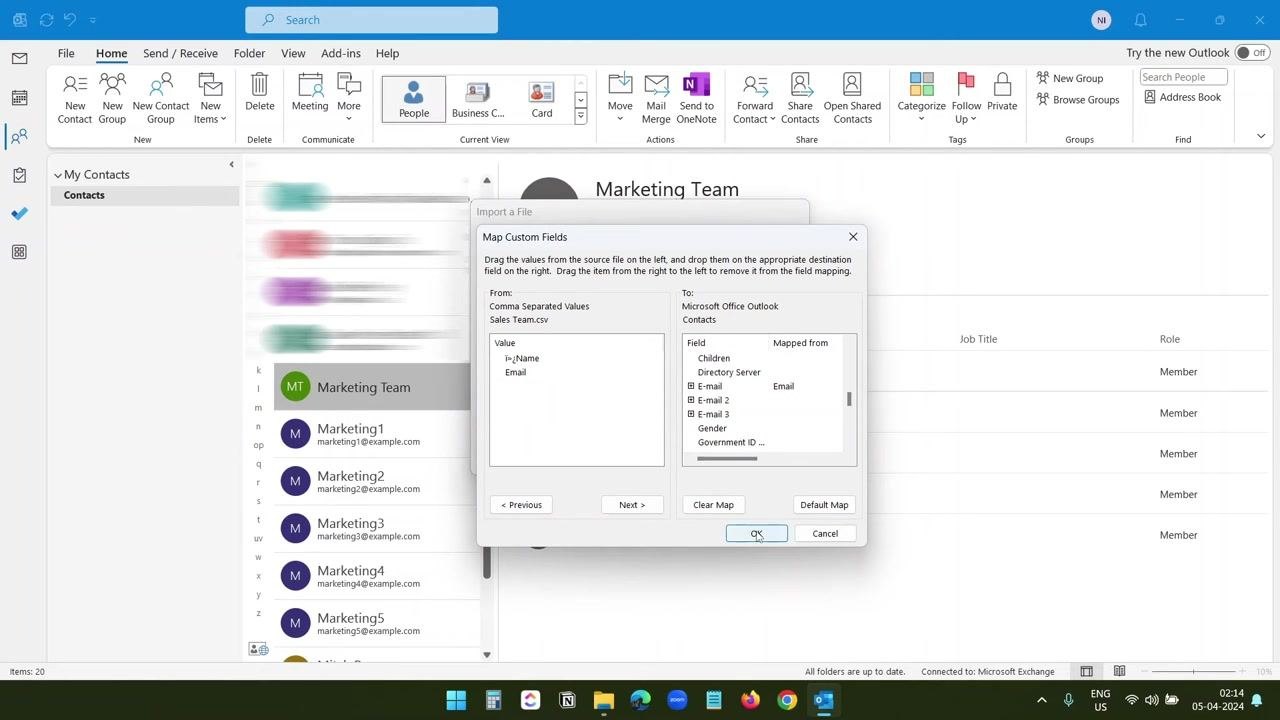 Map Custom Fields dialog open in Outlook with CSV fields mapped to Outlook contact fields and the OK button highlighted