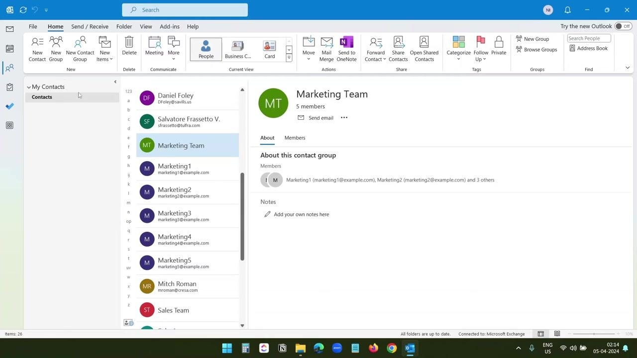 Outlook Contacts view with the Marketing Team group selected, showing the Send email option