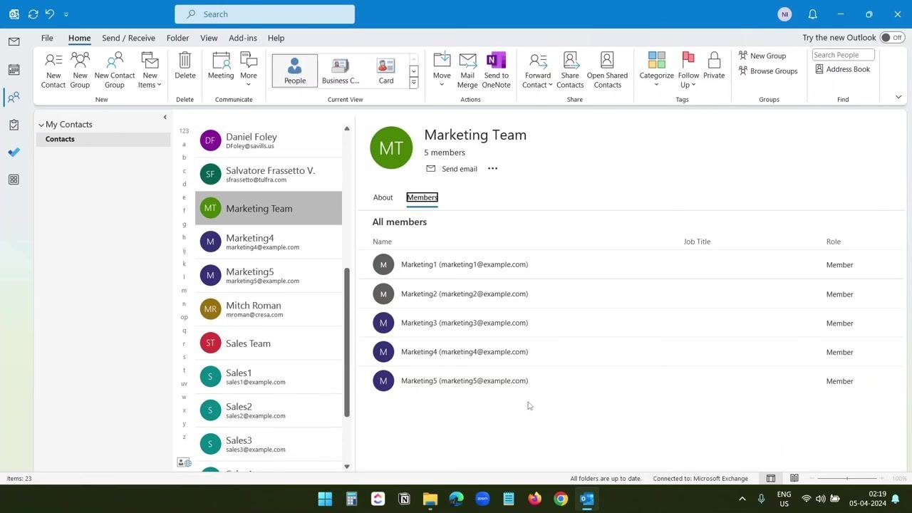 Outlook Contacts view with Marketing Team selected, now showing four members after a removal