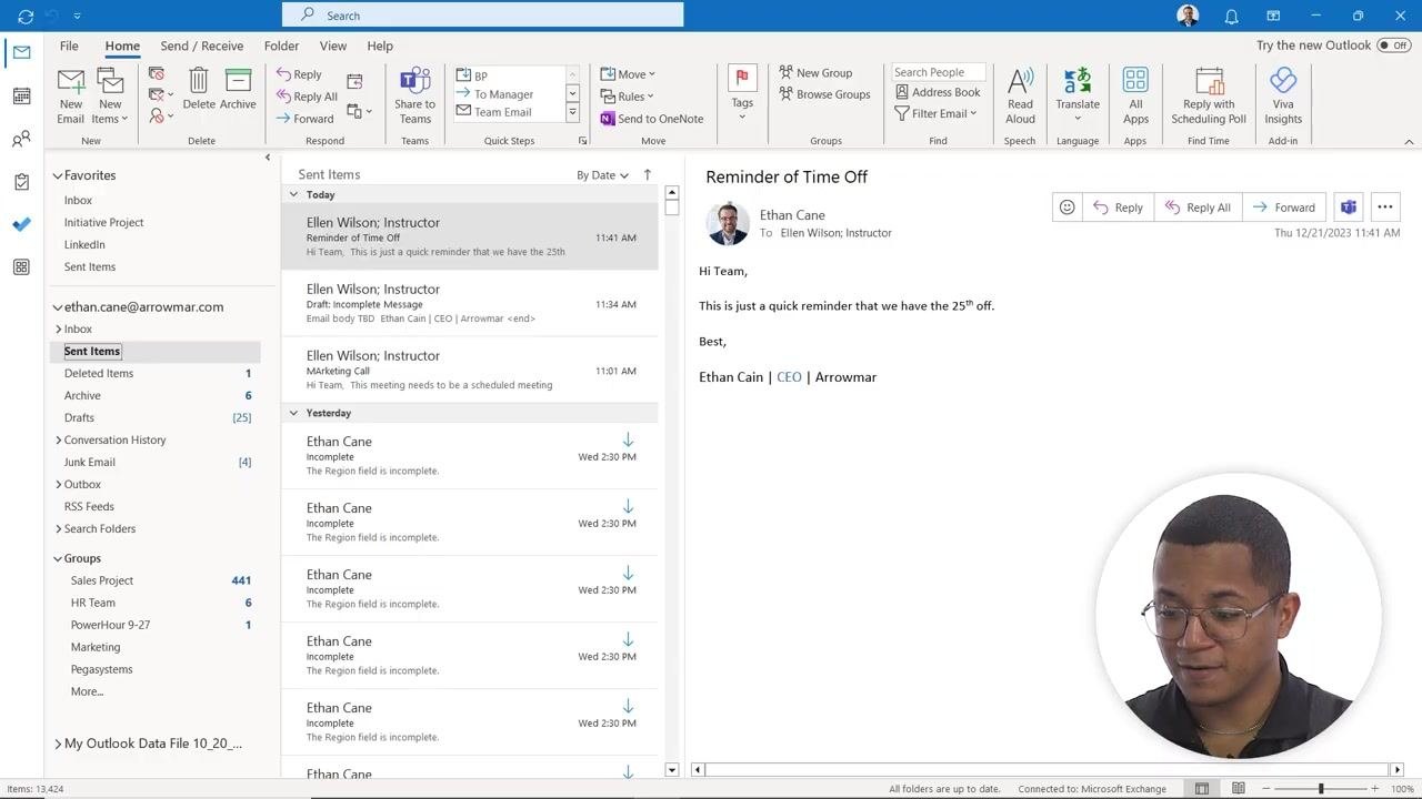 Outlook main window showing Sent Items, the email list, and the reading pane