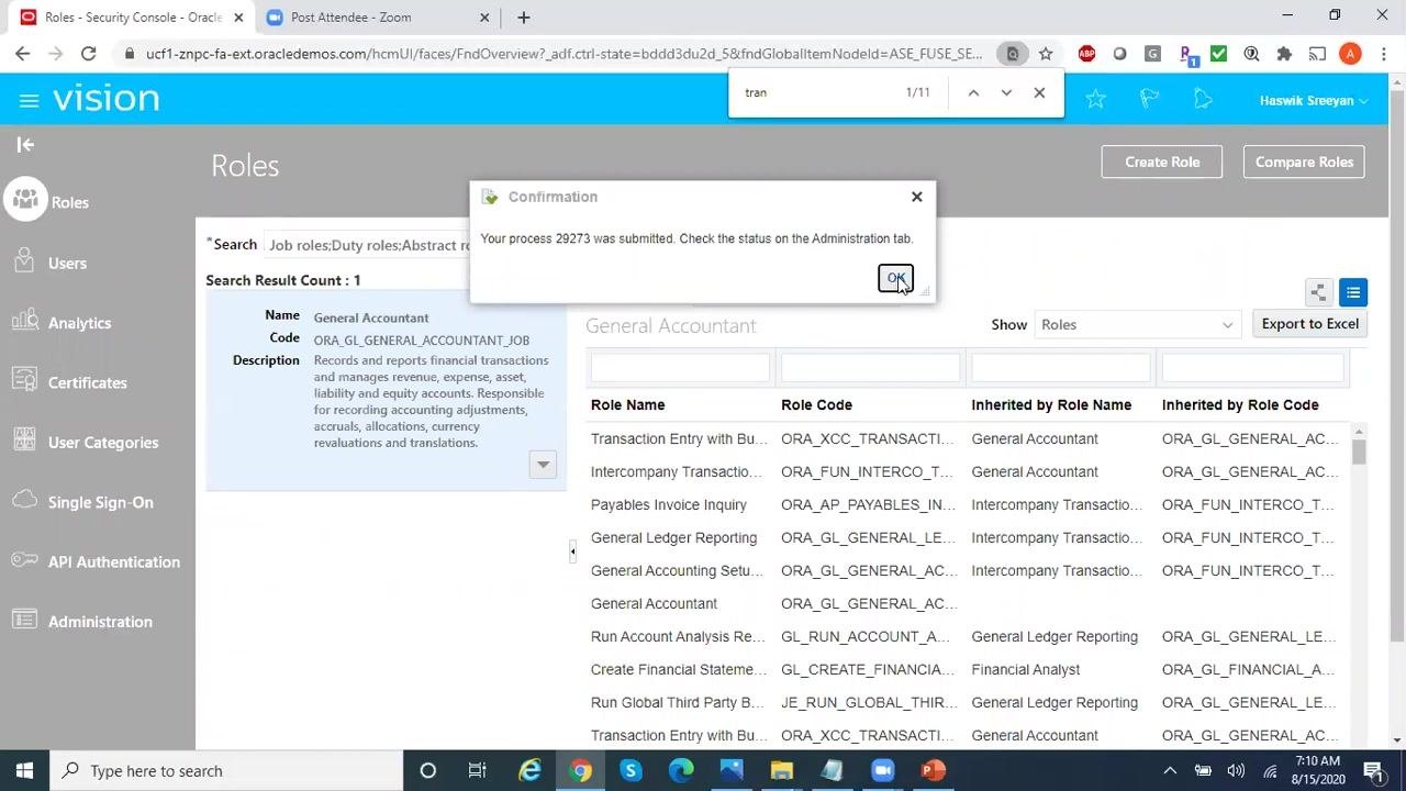 Confirmation dialog stating "Your process 29273 was submitted. Check the status on the Administration tab." with an OK button. The Roles screen is visible in the background.
