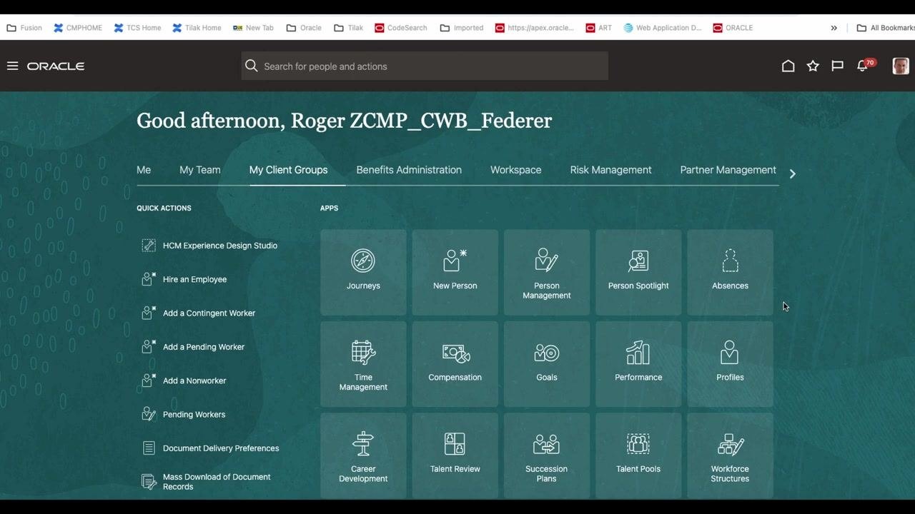 Oracle HCM home screen with navigation tabs, quick actions, and application tiles, greeting the user "Good afternoon, Roger ZCMP_CWB_Federer."