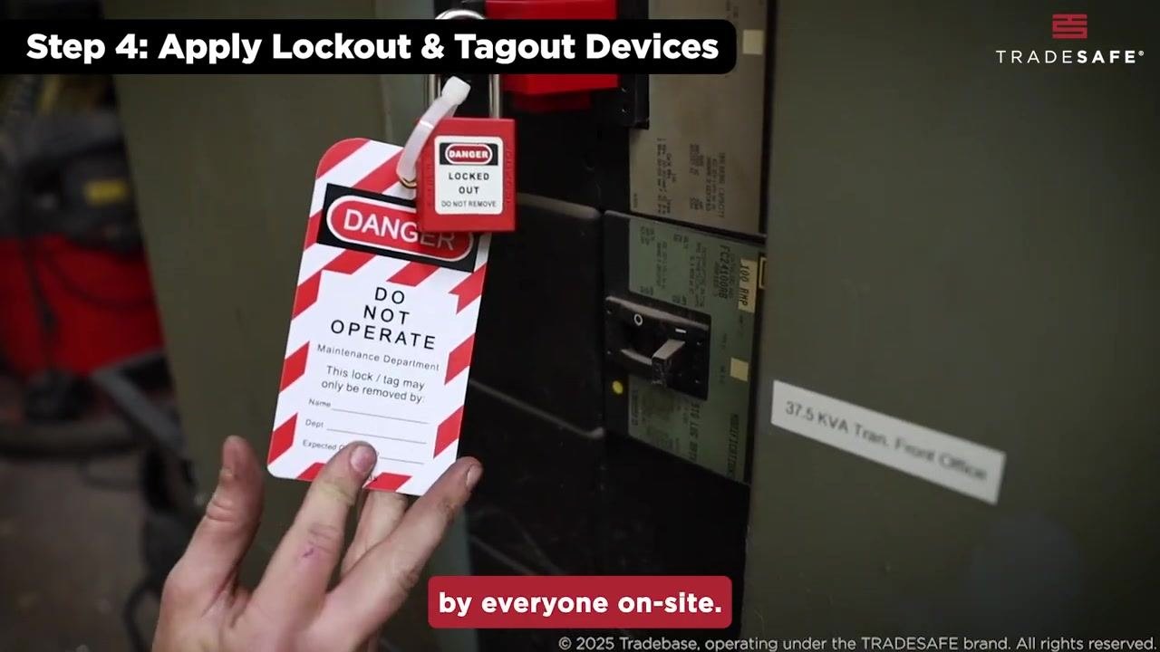 Lockout tag and lock applied to a breaker, with the tag reading "DANGER DO NOT OPERATE"