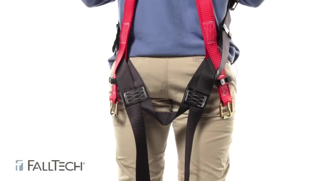 Close-up of the sub-pelvic strap positioned just below the buttocks, showing proper placement and adjustment