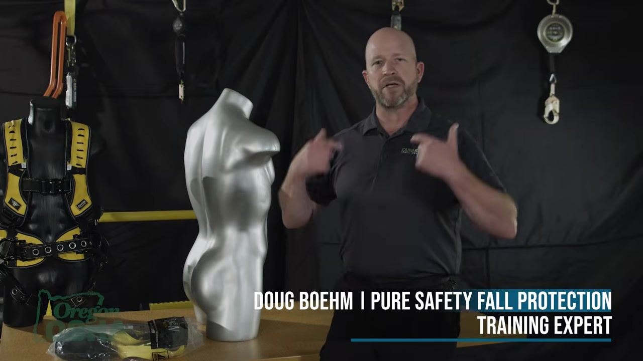 On-screen text: "STEP 2: SHOULDER STRAPS" over blurred background of instructor and mannequin