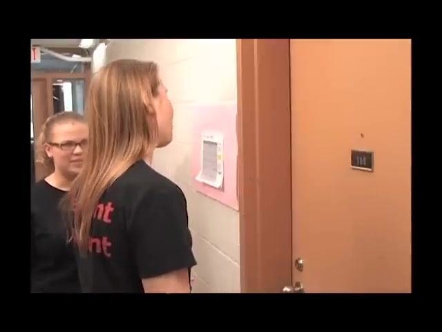 Close-up of an assistant explaining the next steps if there is no answer at the door.