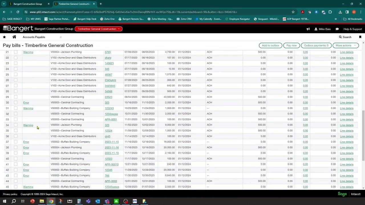 Pay bills screen showing vendor compliance column with Warning and Error links for various bills