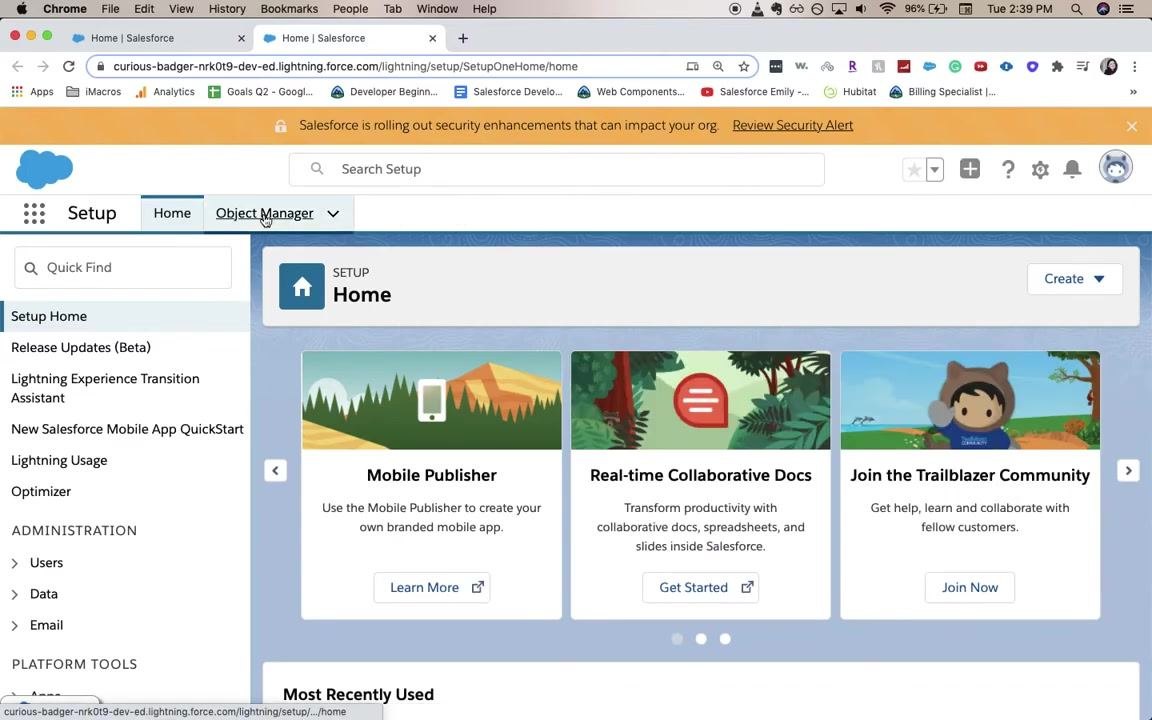 Salesforce home page with the gear icon dropdown open and the cursor on "Setup"