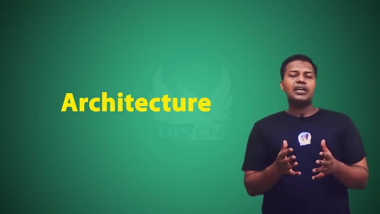 Presenter introducing the "Architecture" topic, large yellow text on green background.