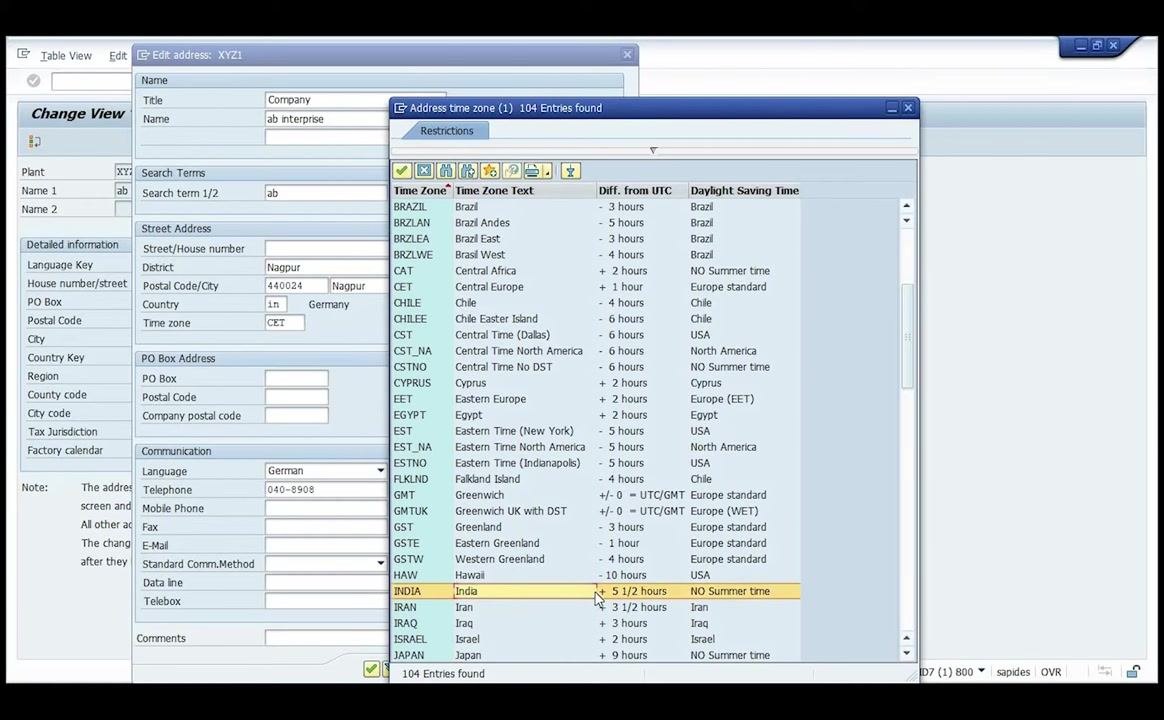 SAP Edit address window with the Address time zone dialog open, 'INDIA' time zone highlighted for selection