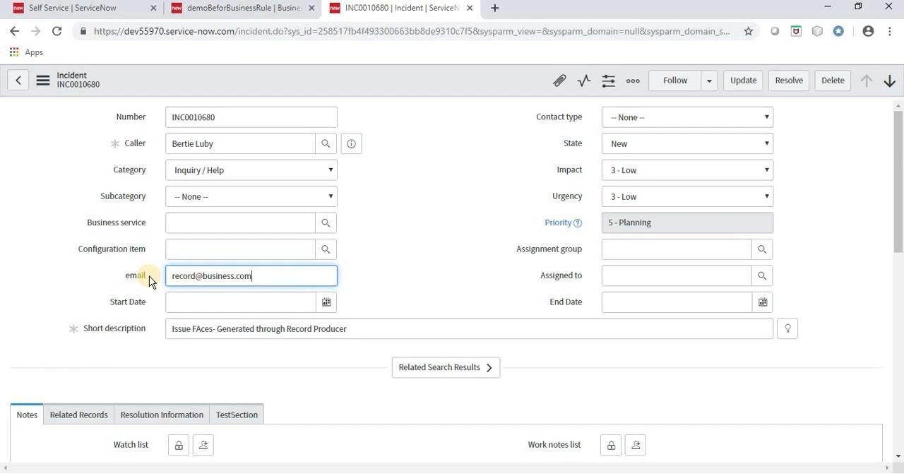 Incident record with the email field showing record@business.com and the cursor pointing at the field