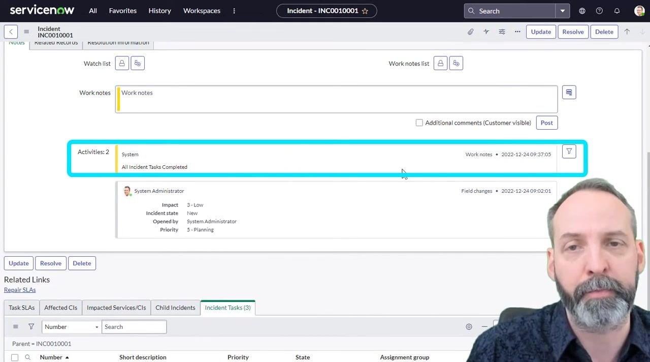 ServiceNow incident record showing work note "All Incident Tasks Completed"