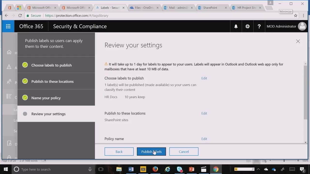 Review your settings screen with the HR Docs label, SharePoint sites location, and the Publish labels button highlighted
