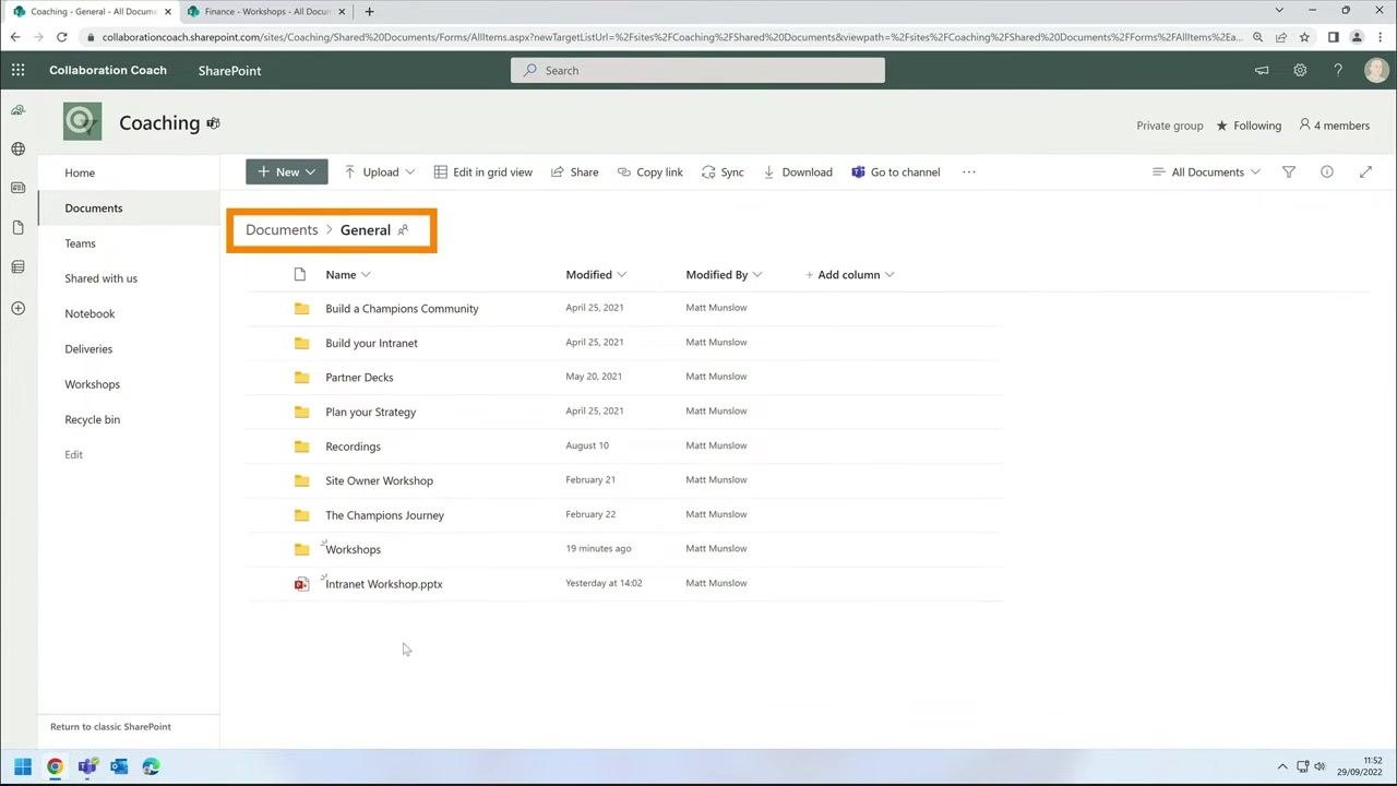 Dragging "Intranet Workshop.pptx" toward the "Workshops" folder, both highlighted