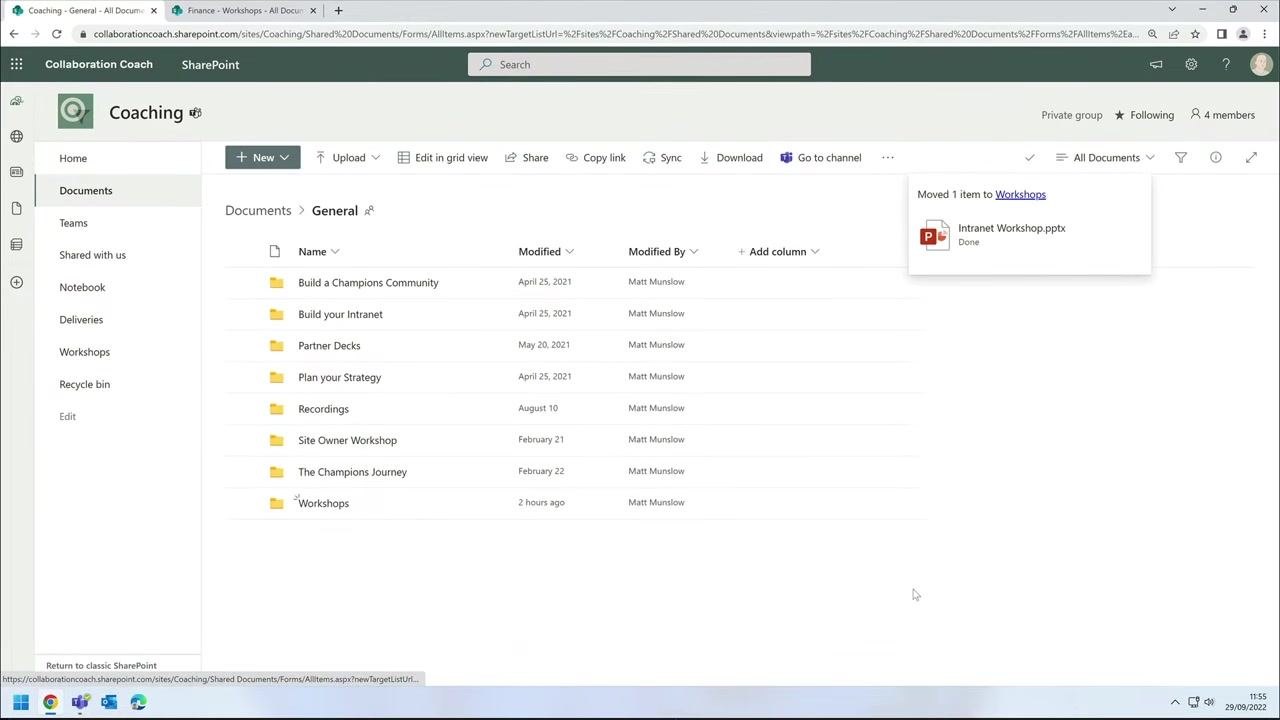 Confirmation message reading "Moved 1 item to Workshops" with the file name and a "Done" status