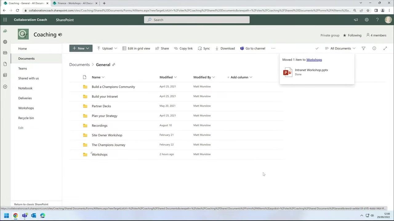Confirmation message reading "Moved 1 item to Workshops" with the file name and a "Done" status