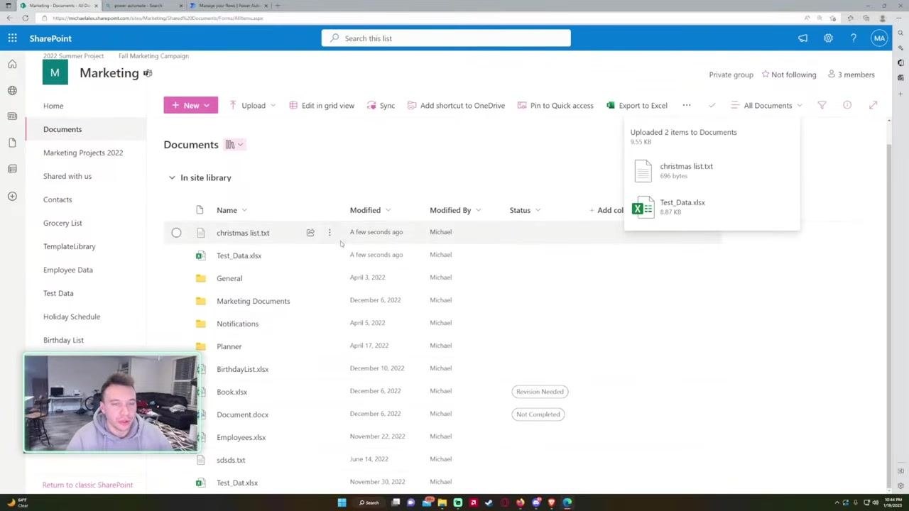 Documents library showing newly uploaded files alongside the upload confirmation notification.
