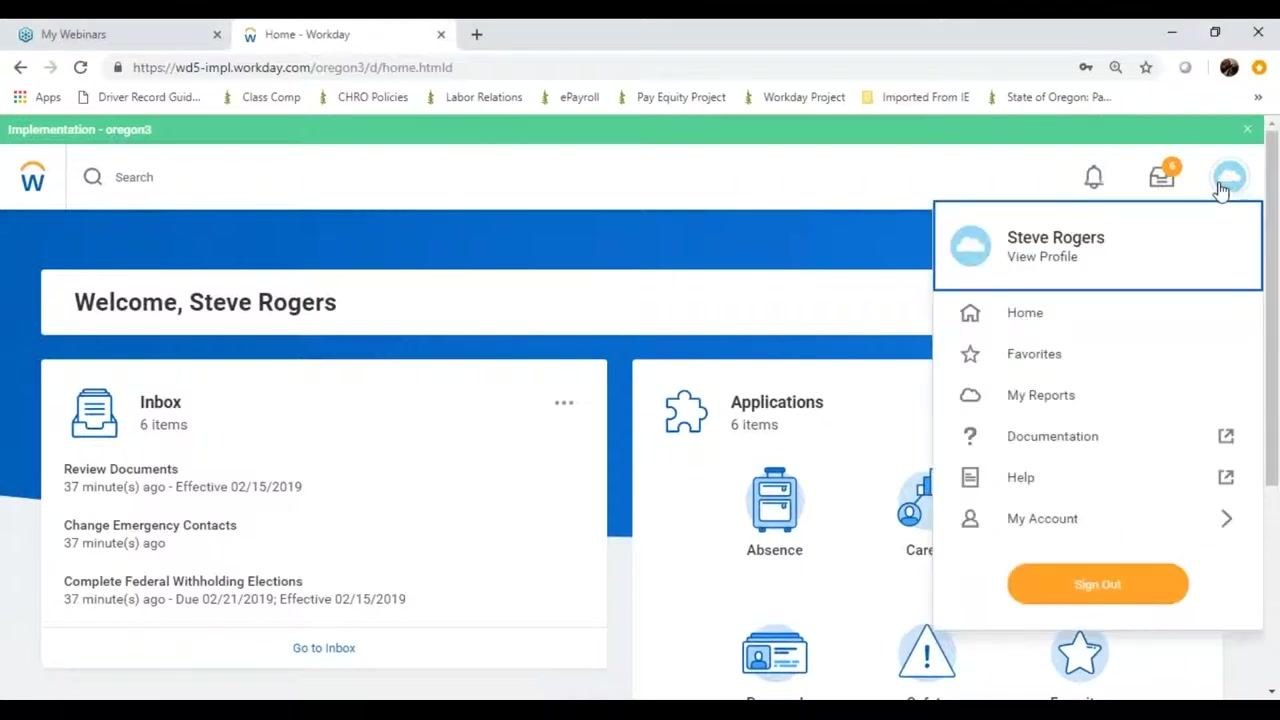Profile menu open from the cloud icon, showing the user's name, View Profile, and other menu options